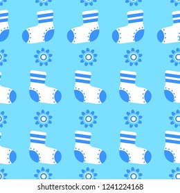 Pattern for boys with pacifier and flowers on blue background. Suitable for textile, fabric, Wallpaper, greetings, wrapping paper.