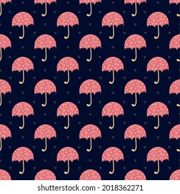 pattern with bright red umbrellas and hearts on a blue surface. Cute autumn pattern with an umbrella