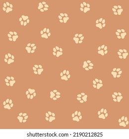 Pattern in brown with dog paws. The print is suitable for clothing, children's clothing, bed linen, icons, stickers.