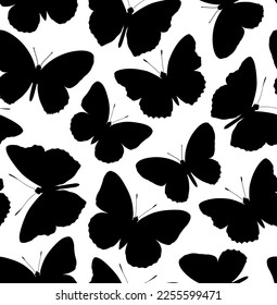 Pattern with butterflies. Black butterflies on a white background.