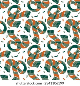 Pattern of cartoon autumn knitted scarves Seamless pattern with scarves for cozy autumn, winter weather. Printing on textiles and paper