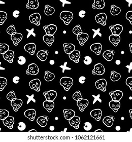 Pattern with cartoon skull heads isolated on black.  Halloween vector 