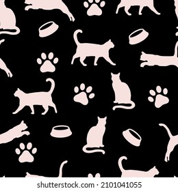 Pattern of cats on a black background. Vector. Seamless print.