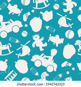 A pattern with children's toys and a boy in a car on a blue, turquoise background