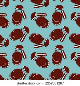 Pattern of chocolate chip cookies with filling and biscuit crumbs on a blue background, hand drawn doodles. National Cookie Day.