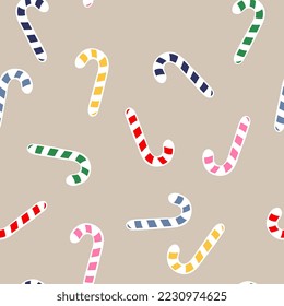 Pattern of Christmas candy canes in different colors