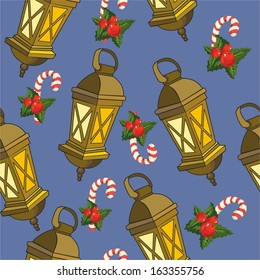 pattern with Christmas lantern on a blue background with sweets
