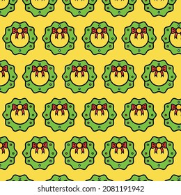 Pattern with Christmas wreaths on a yellow background. Holiday concept. Winter time. Can be used as a background.