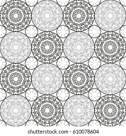 A pattern of circles in contrasting colors. Black and white seamless geometric pattern