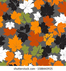 Pattern of colored autumn maple leaves. Orange, brown, green, white and black leaves on a gray background. Seamless natural pattern on an autumn theme.