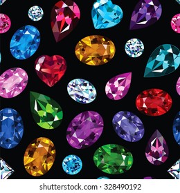 Pattern of colored gemstones on black background.