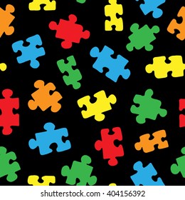 The pattern of colored puzzles on a black background
