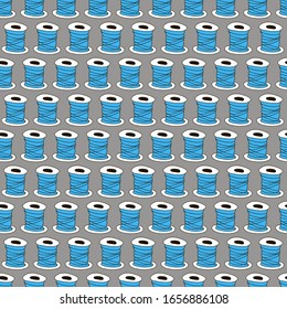The pattern of colored spools of thread. Seamless vector ornament. For fabric, textile, wrapping paper, Wallpaper, background