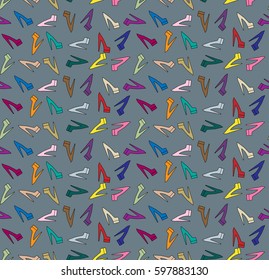 Pattern with colored woman's shoes on the gray background