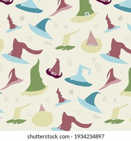 Pattern with colorful witch's hats with ribbons and buckles in handdrawn style on light green background. 