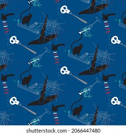 The pattern contains images of a witch's hat, a web, a witch's boot, a black cat with red eyes, a tree branch, a fork, a skull, a glass, a bone, and a frog leg.