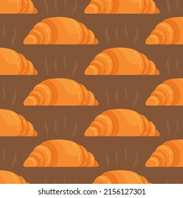 A pattern of crispy croissants on a brown background. Breakfast. 