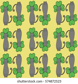 Pattern designed for st.patrick's day with cat and clover in pastel colors