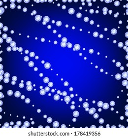 pattern of diamond beads on a dark blue background