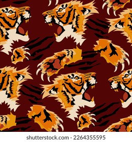 A pattern at different angles of a vector image of a tiger's head and a paw cutting the material, on a red background. Abstract illustration, simplified spots in layers. Print banner, leaflet