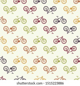 pattern of different sized and colored bicycles on light  background. colorful vector illustration 