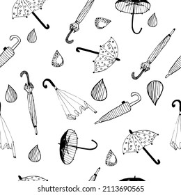 Patrón de paraguas y gotas de dibujo de dibujos