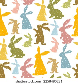 Pattern of Easter bunnies made of polka dot fabric sewn. Rabbit toys for children. Rabbit or hare, a spring festive animal for Easter. Cartoon festive simple vector character made of fabric. Small big