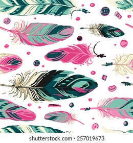 Pattern of ethnic feathers. Ethnic seamless pattern in native style. Bright colored feathers and beads on white background. Vector decorative elements hippie