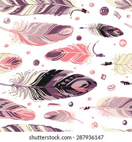 Pattern of ethnic feathers. Ethnic seamless pattern in native style. Bright colored feathers and beads on white background. Vector decorative elements hippie
