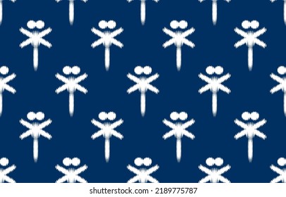 pattern ethnic ikat white and blue ikat ethnic design background. Seamless ikat dragonfly pattern in tribal, folk embroidery abstract art. dragonfly ornament decorative print.