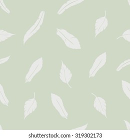 pattern of feathers. bezshovey pattern of feathers, light color. green background.