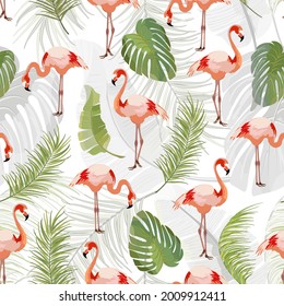 Pattern with flamingos and leaves.Flamingo and palm leaves on a white background in a vector pattern.