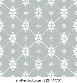 Pattern with floral ornament. Flowers of heart shape. White ornament on a gray background. Vector seamless pattern. 