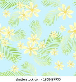 pattern floral tropical . foliage of palm and flowers manoi on light blue background