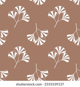 Pattern with Ginkgo biloba leaves silhouette. On mocha mousse background.