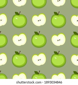 Pattern of green apple and halves on a gray background