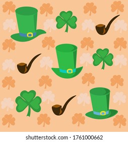 Pattern. Green hats, briars and clover leaves on orange background. Vector graphic image.