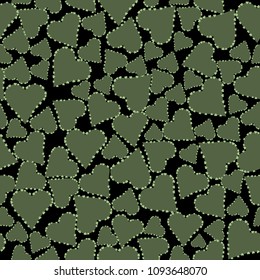 
pattern of green hearts on a black background