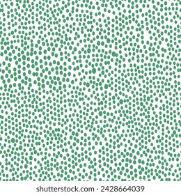 A pattern of green oval dots on a white background.