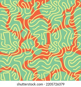 pattern of green spots on an orange background with yellow lines