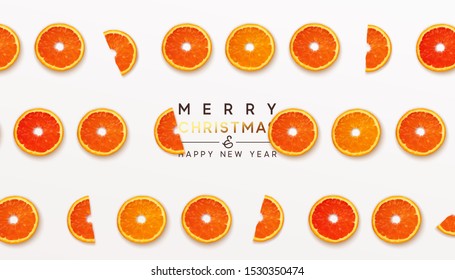 Pattern half cut with orange fruits and grapefruit on white background. Happy New Year and Merry Christmas