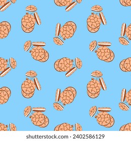Pattern with hand drawn cookies, color trend 2024 Peach fuzz on blue background, doodles. National Cookie Day.
