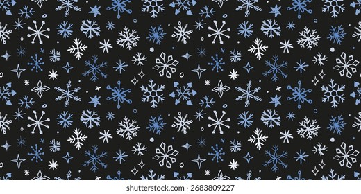 Pattern with hand drawn snowflakes and stars in white and blue on black. Snowflakes with crayon, chalk, or pastel textured background.