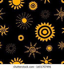 Pattern with hand drawn sun symbol stylized in folk ethnic style of ancient culture. Gold yellow on black background. Seamless design. Great for fabric, scrapbooking and textile. Vector