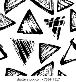 Pattern with hand drawn triangles made with ink. Abstract geometric pattern.