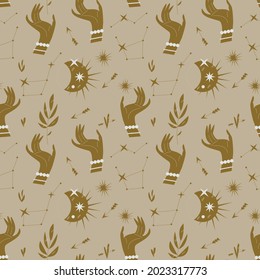 Pattern with hands, stars and celestial bodies in a minimalist style. Seamless mystical pattern on the theme of Tarot cards, mysticism and magic. The golden beige color is a beautiful decor