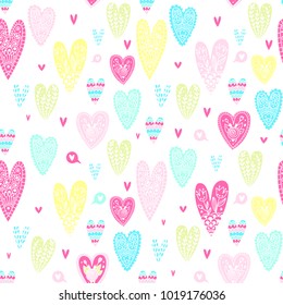 Pattern of hearts in the doodle style. Beautiful hearts with hand-drawn patterns for Valentine's day. Bright and colorful pattern