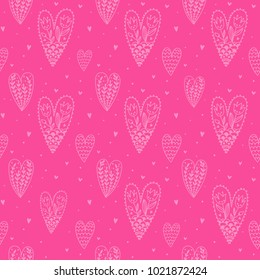 Pattern of hearts in the doodle style on pink background. Beautiful hearts with hand-drawn patterns for Valentine's day