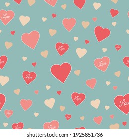 Pattern with hearts and the inscription love. The design is perfect for wrapping paper with Valentine's Day gifts or birthday gifts.