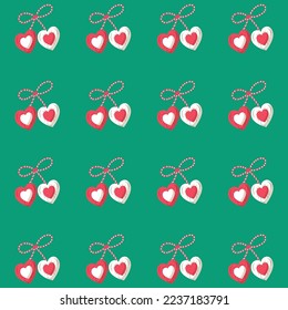 Pattern of hearts on green background of the baba marta festivity